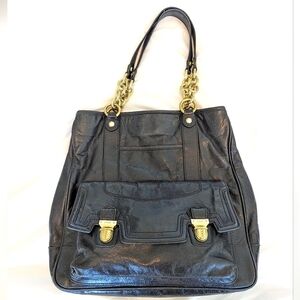 Coach Vintage Poppy Camellia black leather purse with gold hardware